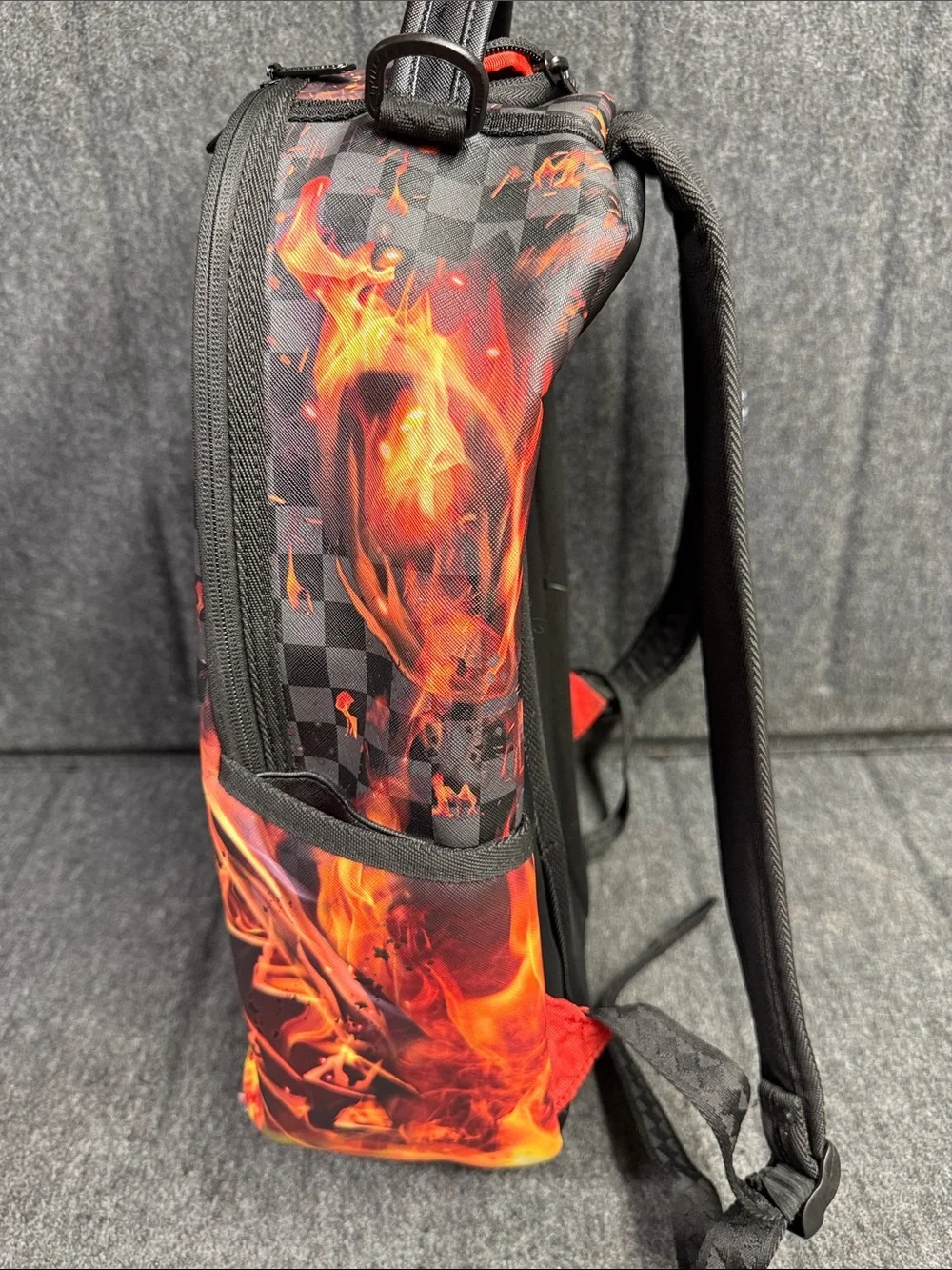 Sprayground Black Backpack with Orange Flame & Blue Ice Graphic